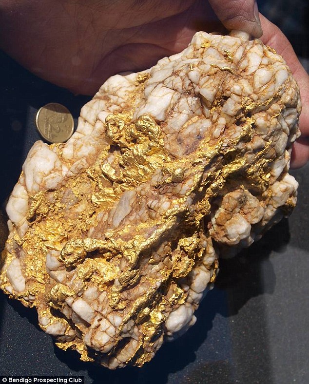 He's struck gold! Mysterious young father hits the jackpot after finding two giant nuggets worth almost 0,000