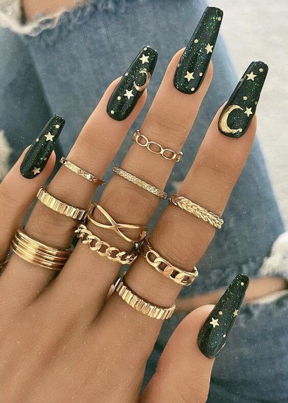 unique dark emerald long coffin with golden stars and moon nail design ideas