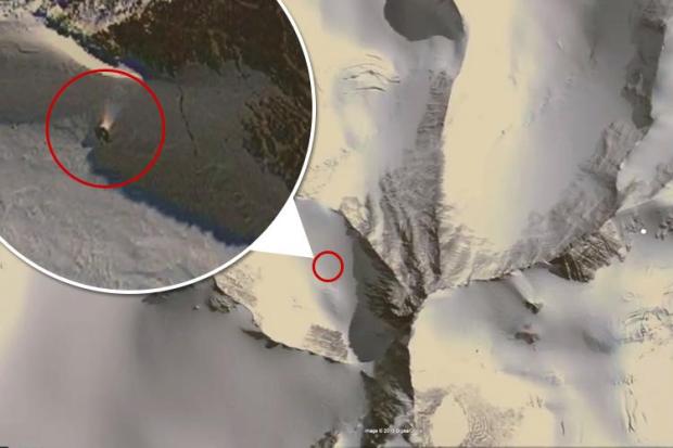 Conspiracy theorists think they've found a 'spotlight pointing to a model city' in a remote Antarctic mountain on Google Maps | The Sun