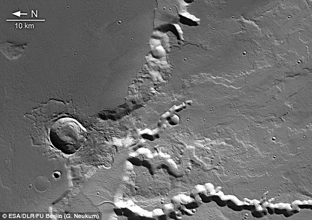 The Medusa Fossae formation is an extensive unit of enigmatic origin found near the boundary between the Tharsis and Elysium centres of volcanic activity, according to the European Space Agency