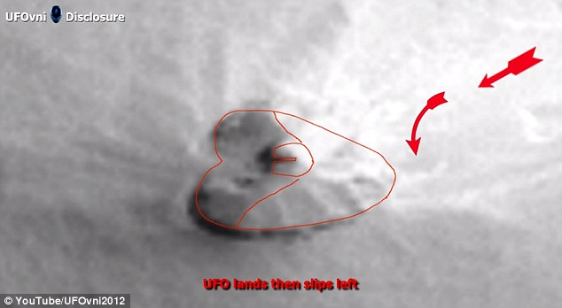 Using pH๏τographs released by Nasa, YouTube channel 'UFOvni2012' has put together a video pointing out how a dark shape (pictured), that looks remarkably similar to a rock, could be a crashed UFO