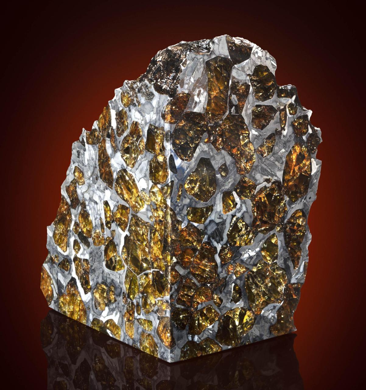 Polished piece of a rare Fukang Pallasite meteorite, found in the Gobi Desert : r/pics