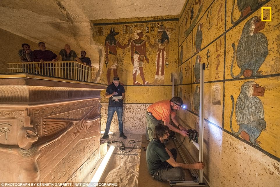 The ministry said the scans will be carried out over a week to check for the existence of any hidden chambers behind the tomb. Pictured are scientists setting up radar equipment for the new study