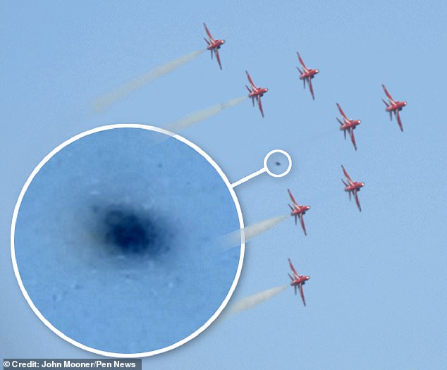 John Mooner captured a UFO among the Red Arrows formation at the Torbay Airshow