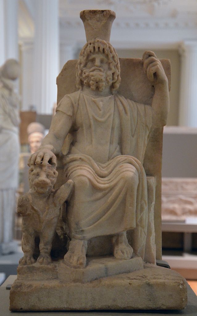 Marble statue of Serapis seated on a throne and resting one hand on  Cerberus, the triple headed hound who guarded the Underworld, about 100-200  AD, Fitzwilliam Museum, Cambridge