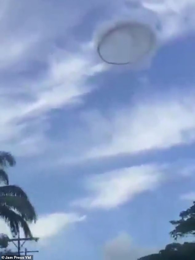 A bizarre, ring-shape UFO that appeared in the skies above Venezuela was recorded by a pair of stunned friends