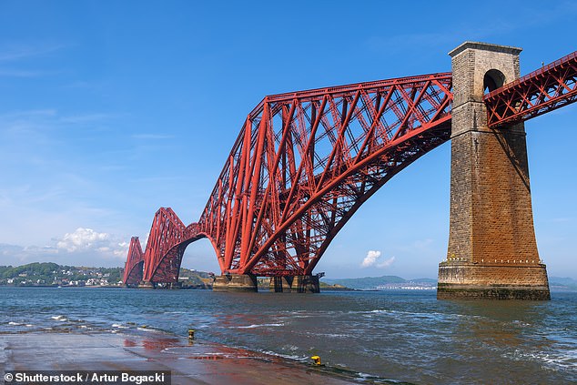 Researchers from Climate X used climate models to predict how flooding, coastal erosion, landslides, wind-based hazards, storms and cyclones will impact landmarks around the world. Pictured: The Forth Bridge in Scotland