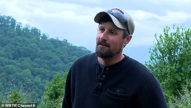 Justin Clontz (above) was working grounds maintenance at Glamping Collective, a luxury campsite in Haywood County, North Carolina when he made the bewildering discovery. he had to tow the 'UFO' out of the area with a riding lawnmower because it was so mᴀssive and heavy