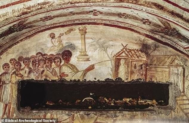 In one painting, Jesus holds a wand over the cadaver of Lazarus before he performs the miracle of raising him from the ᴅᴇᴀᴅ. This image was painted in the fourth century, although the exact date is unknown, and was found at the Catacomb of Via Latina in Rome