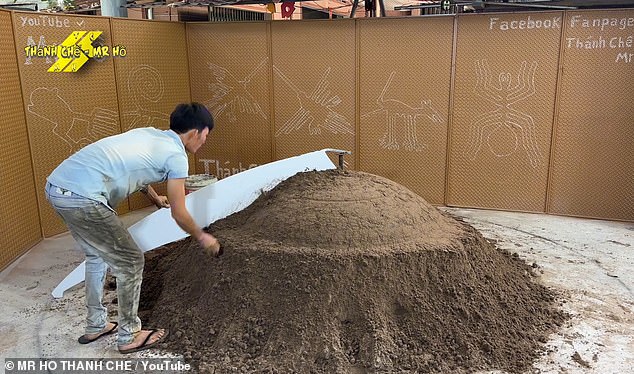 Mr Ho begins by sculpting a UFO shape out of sand which he uses to make a concrete mould