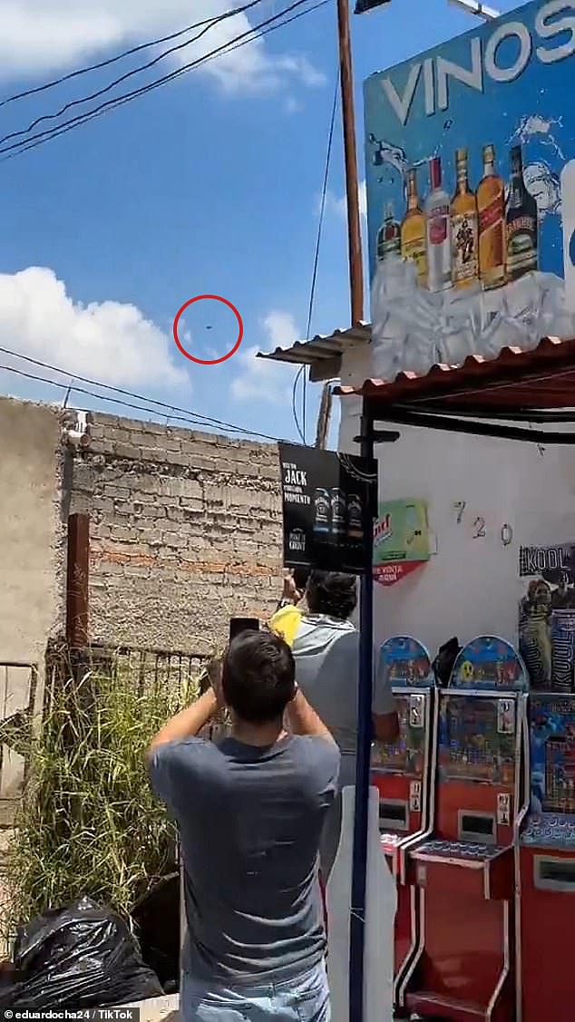 A resident in Mexico records the moment an object, which many believed was a UFO, flew through the skies of western city of Guadalajara last week