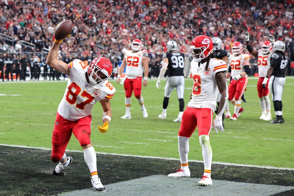 Travis Kelce (87) spikes the ball after catching his first touchdown of the season on Oct. 27, 2024.