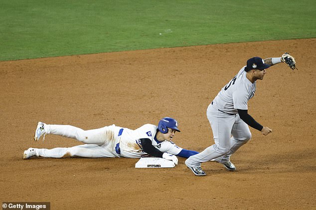 Ohtani took off from first base in a steal attempt before being thrown out by Austin Wells