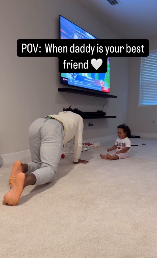 Charvarius Ward playing with his 1-year-old daughter, Amani Joy.