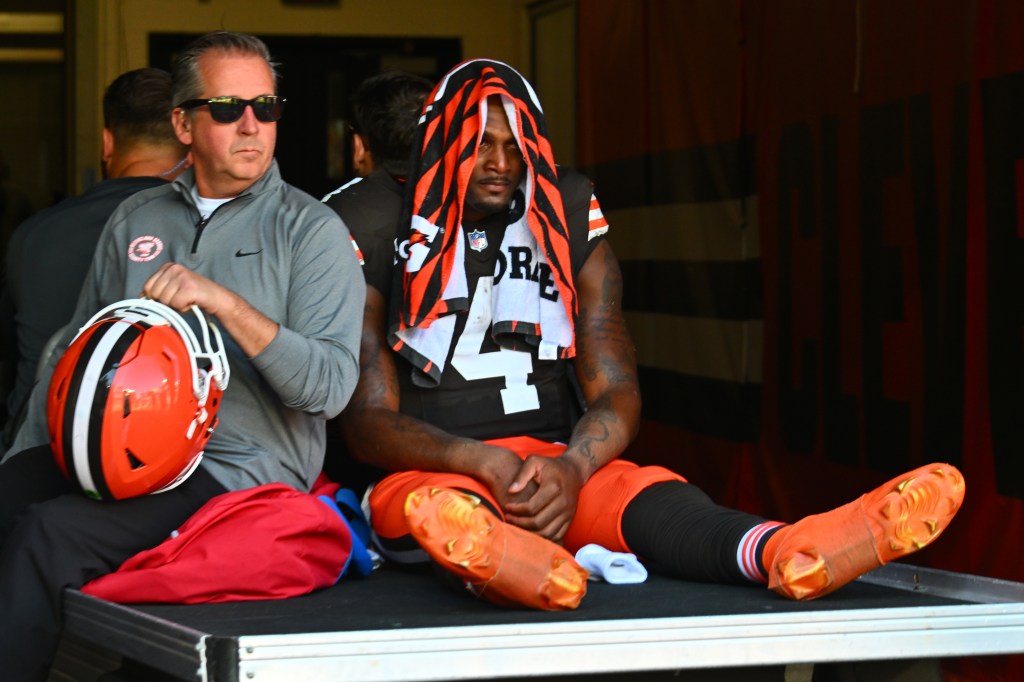 Deshaun Watson of the Cleveland Browns being taken off the field on a medical cart during a game against the Cincinnati Bengals