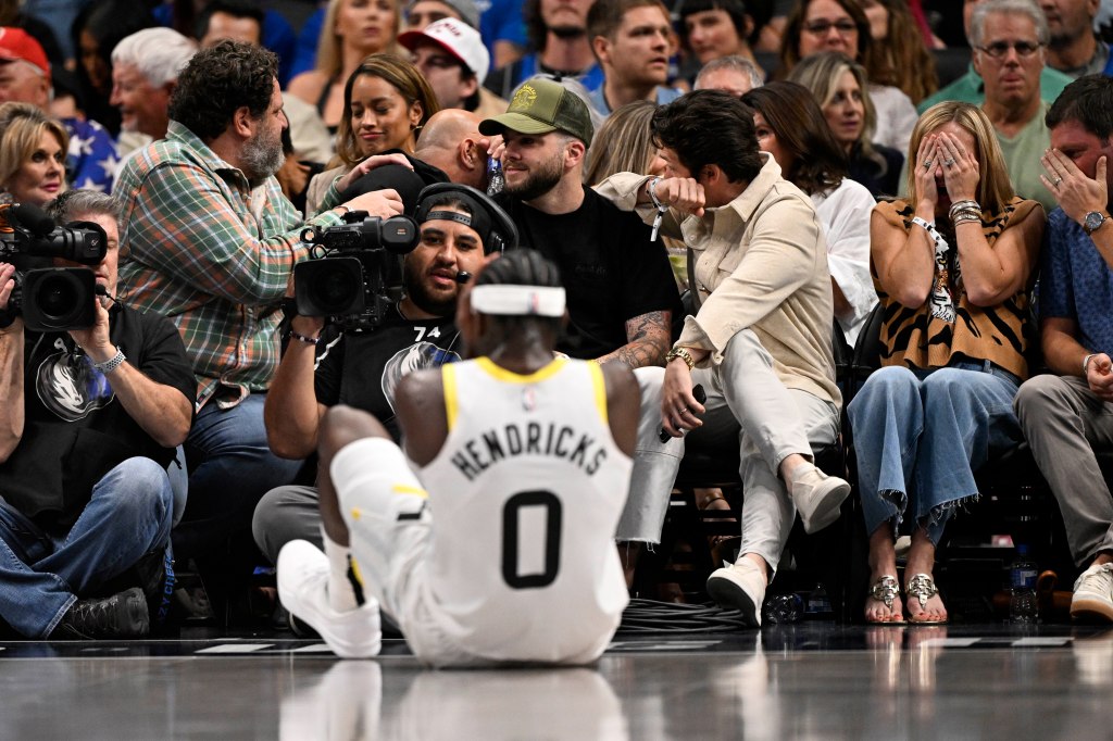 Taylor Hendricks on the floor after suffering his inuury.