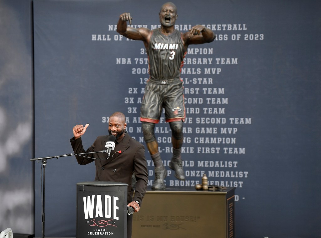 Dwyane Wade speaks during his statue unveiling ceremony outside Kaseya Center, Sunday, Oct. 27, 2024, in Miami, Fla.  