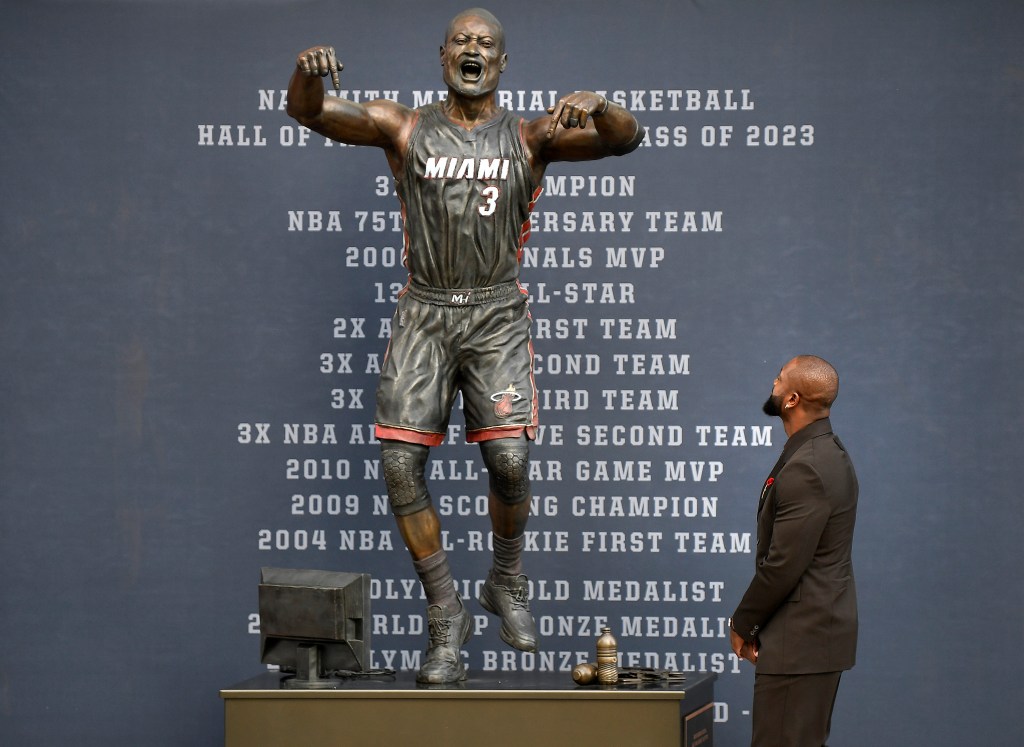 Dwyane Wade speaks during his statue unveiling ceremony outside Kaseya Center, Sunday, Oct. 27, 2024, in Miami, Fla.  