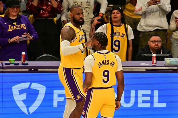 LeBron and Bronny James make history as the NBA's first father-son duo to play  together - CBS Los Angeles