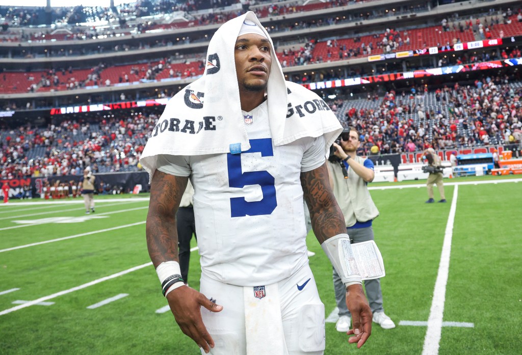 Indianapolis Colts quarterback Anthony Richardson standing on the field after a loss to the Houston Texans