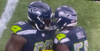 Seahawks defensive lineman Jarran Reed getting into it with linebacker Derick Hall during Sunday's game.