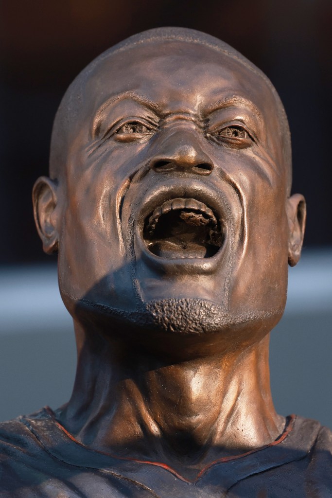 Statue of Dwyane Wade, first in Miami Heat history, outside Kaseya Center, depicting iconic 'this is my house' celebration.