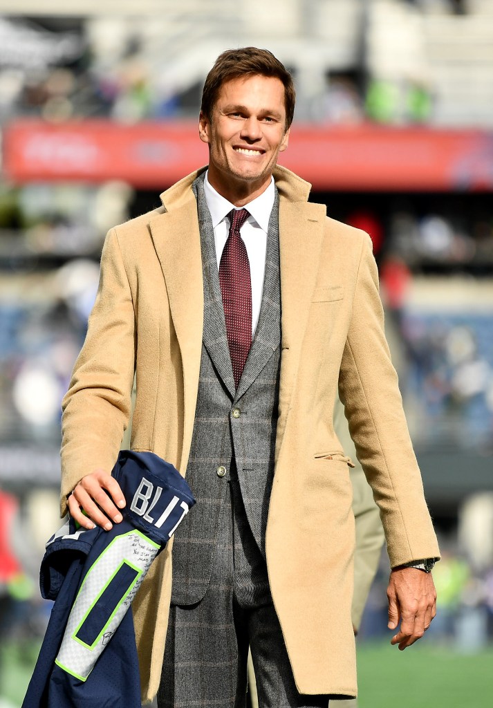 Tom Brady is seen on the field prior to a game between the Seattle Seahawks and the Buffalo Bills at Lumen Field on October 27, 2024 in Seattle, Washington. 