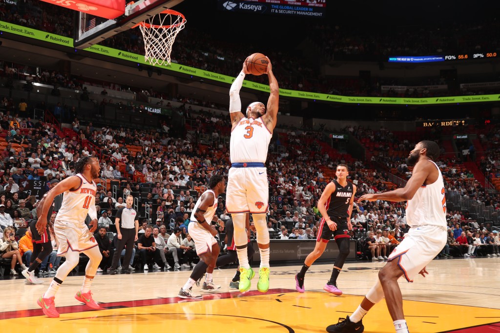  Josh Hart #3 of the New York Knicks goes up for the rebound during the game against the Miami Heat on October 30, 2024 at Kaseya Center in Miami, Florida. 