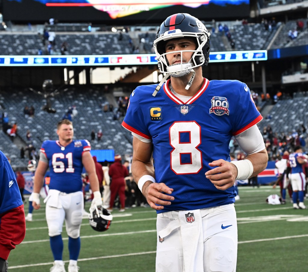 Giants quarterback Daniel Jones (8) walks off the field after the Washington Commanders 27-22 win over the Giants in East Rutherford, N.J. 