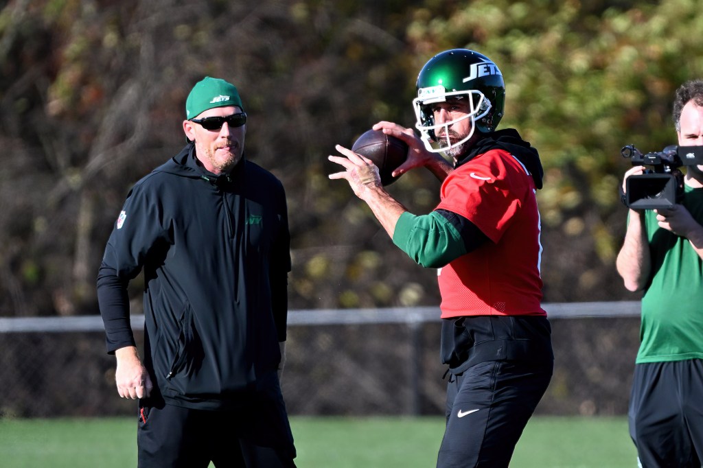 Jets quarterback Aaron Rodgers (8) runs during practice in Florham Park, NJ.  