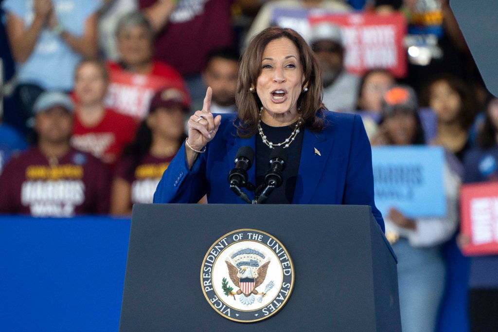 US Vice President and Democratic presidential candidate Kamala Harris gestures as she speaks during a campaign rally at Talking Stick Resort Amphitheatre in Phoenix, Arizona, on October 31, 2024. 