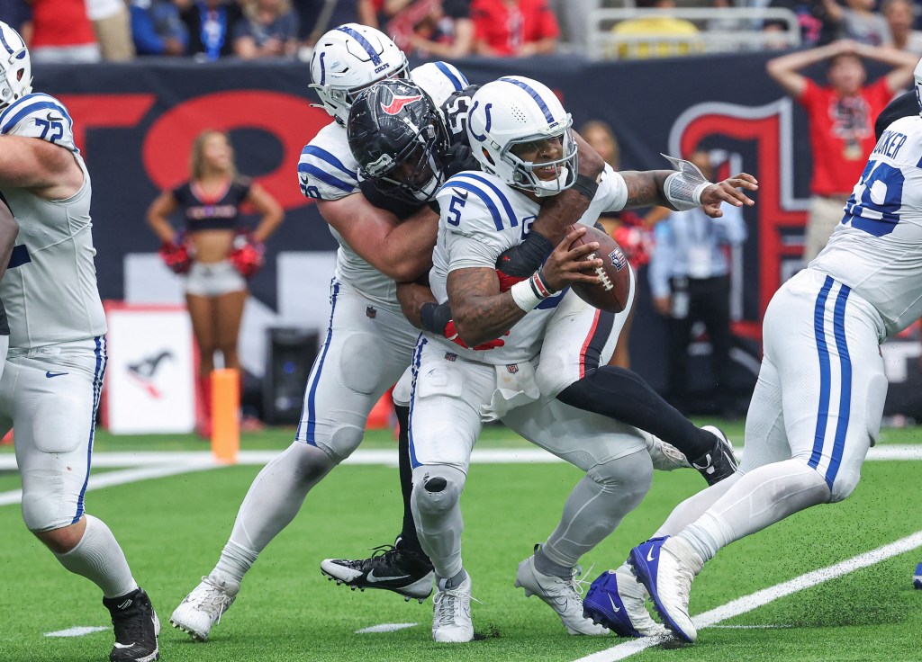 Texans defensive end Danielle Hunter (55) sacks Colts quarterback Anthony Richardson (5) during the fourth quarter at NRG Stadium on Oct. 27, 2024. 