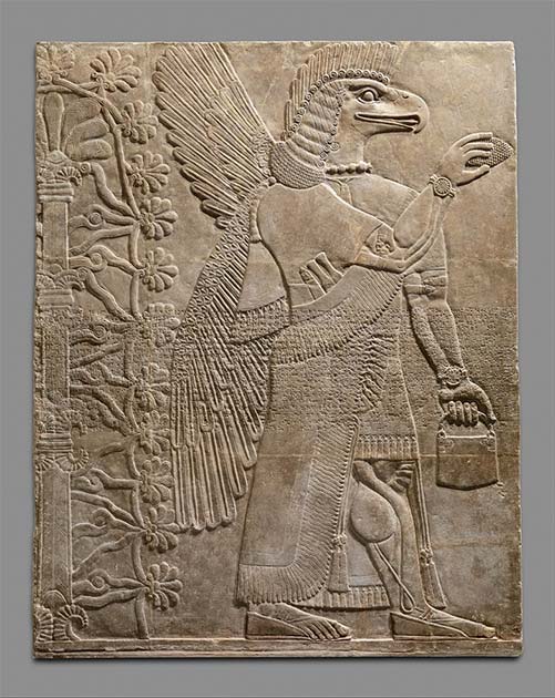 Could the mysterious handbag really represent the cosmos? ᴀssyrian relief carving from Nimrud, 883 to 859 B.C. (Public domain)