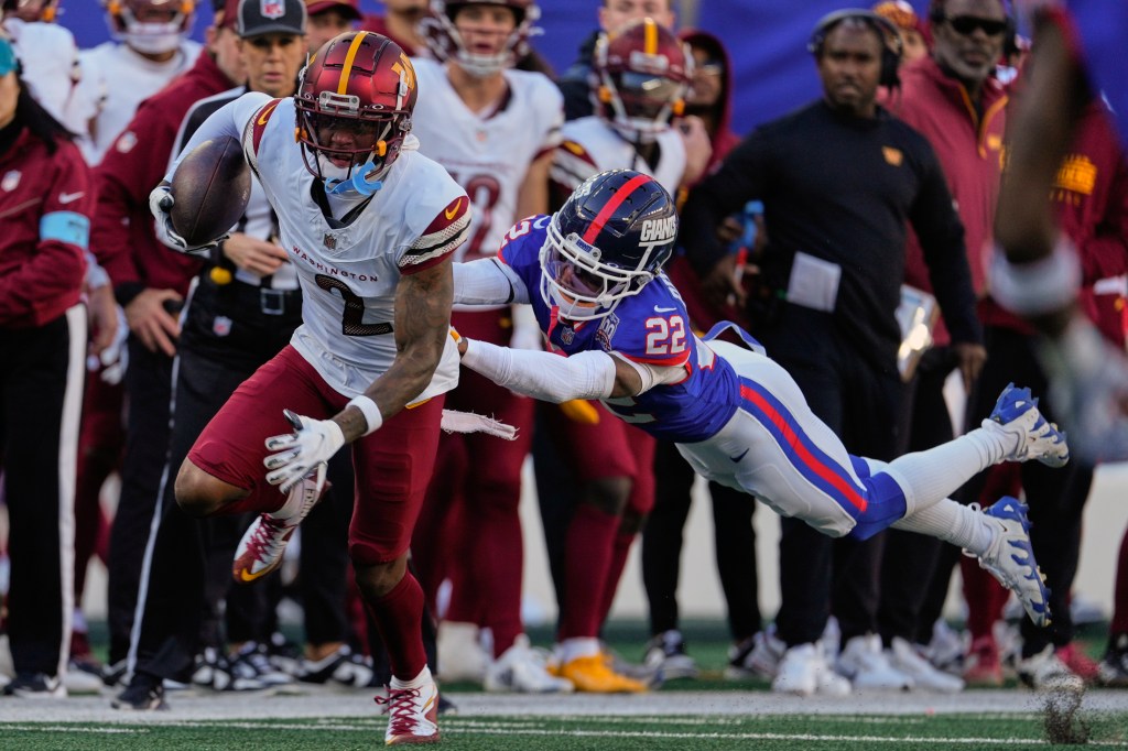 Dyami Brown makes a catch during the Commanders' win over the Giants on Nov. 3, 2024. 