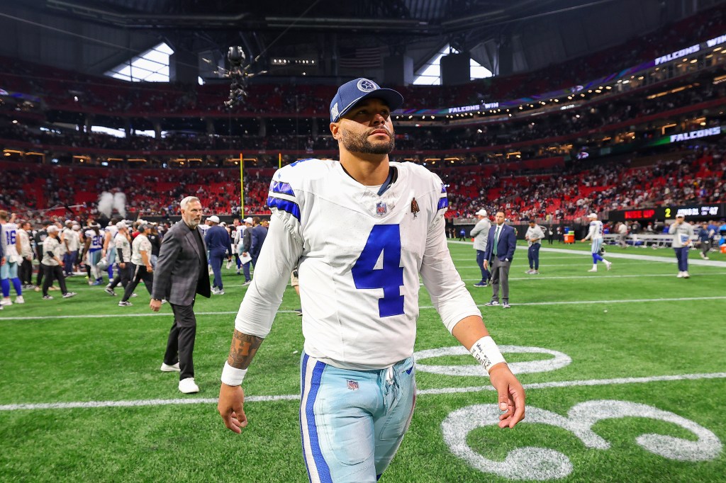 Dak Prescott of the Cowboys walks off the field after a loss to the Atlanta Falcons at Mercedes-Benz Stadium on November 3, 2024.