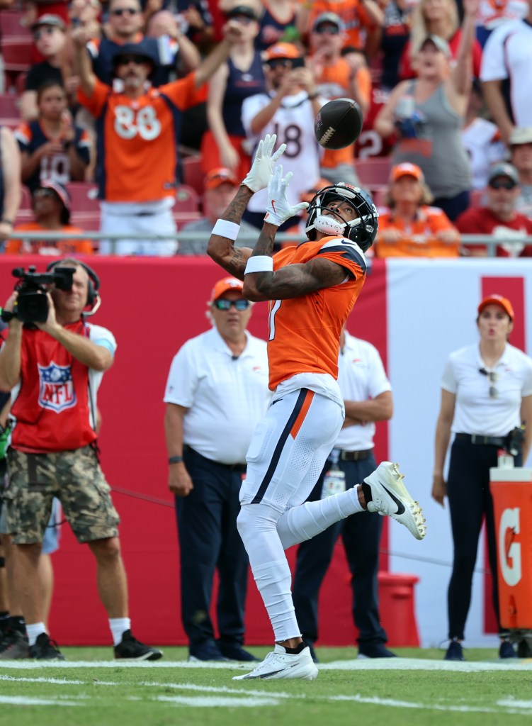 Broncos receiver Josh Reynolds makes a catch against the Buccaneers on Sept. 22, 2024.