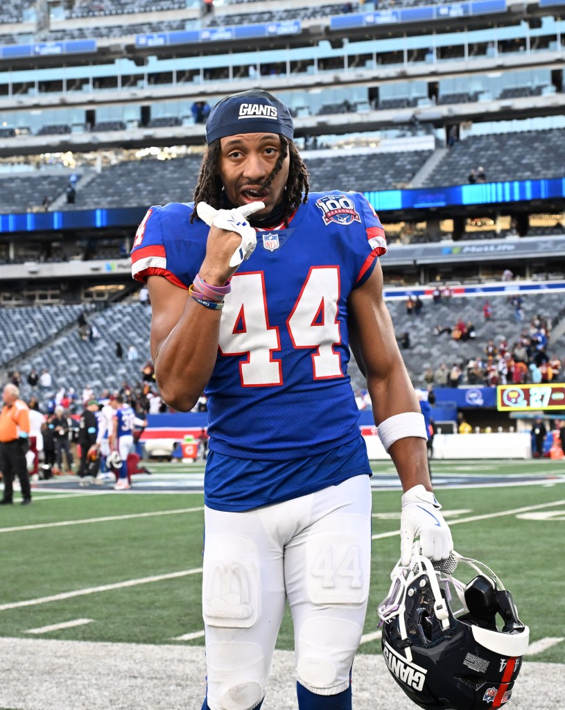 Giants cornerback Nick McCloud (44) leaving the field after a game against the Washington Commanders