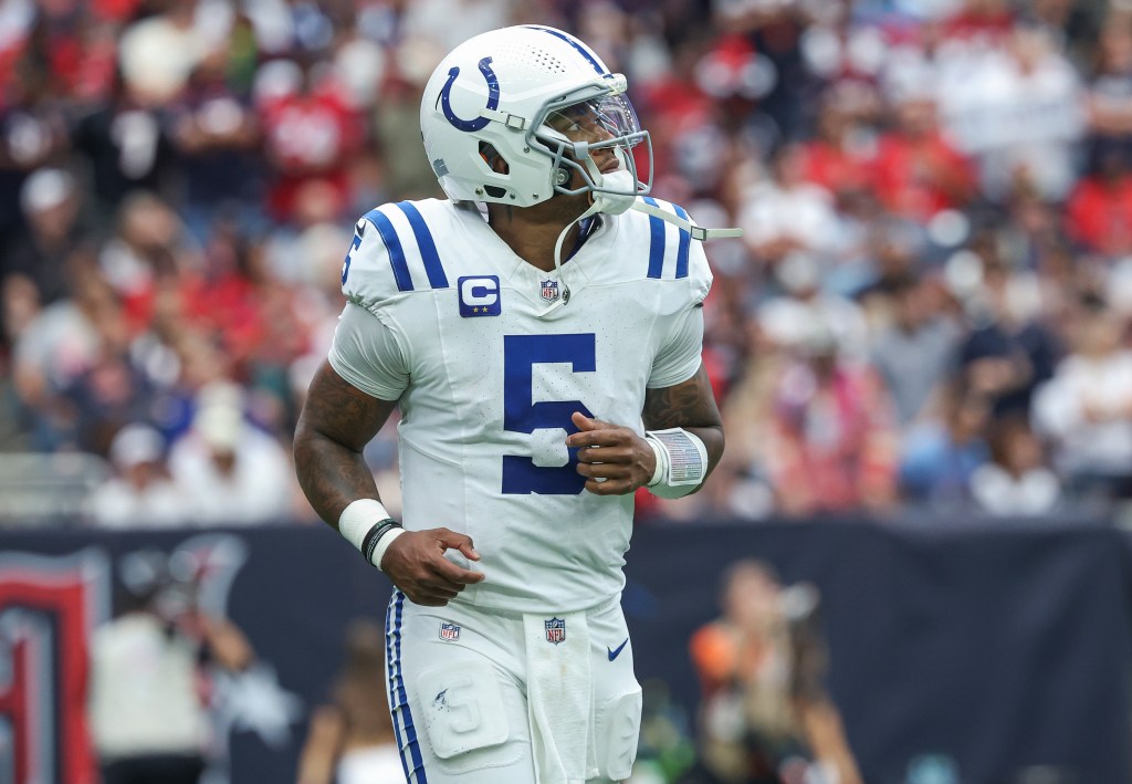 Colts quarterback Anthony Richardson (5) jogs off the field after a play during the second quarter against the Houston Texans at NRG Stadium on Oct. 27, 2024. 