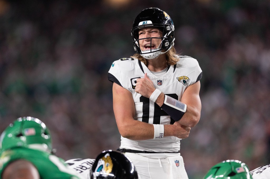 Jacksonville Jaguars quarterback Trevor Lawrence (16) calls a play during the third quarter against the Philadelphia Eagles at Lincoln Financial Field. Lawrence suffered an injury to his non-throwing shoulder during the game.