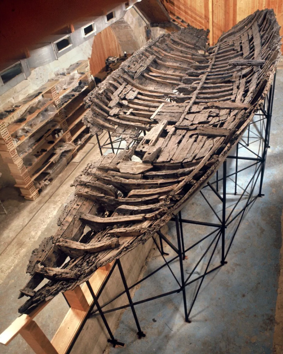 Old wooden ship propped up on stilts