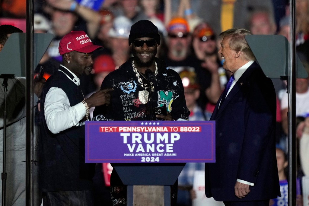 Antonio Brown, left, and, Le'Veon Bell, right, appeared at a campaign rally for Republican presidential nominee and former President Donald Trump in mid-October.