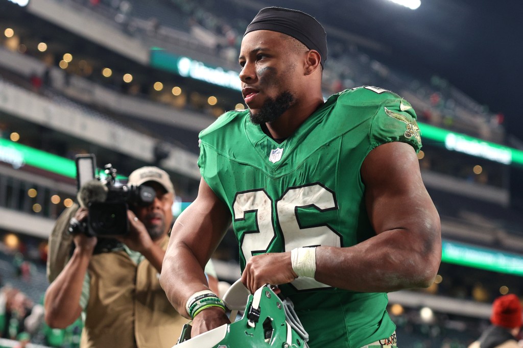 Saquon Barkley #26 of the Philadelphia Eagles walks off the field after his team's 28-23 win against the Jacksonville Jaguars.