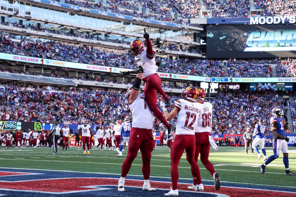 Commanders receiver Terry McLaurin (17) celebrates his touchdown against the Giants with teammates on Nov. 3, 2024.