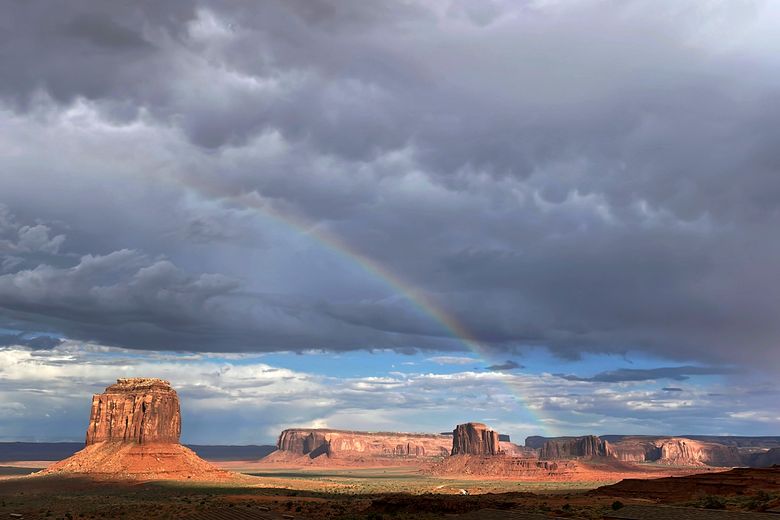 Clouds dissipate after a rainstorm during the monsoon season Friday, June 28, 2024, in Monument Valley, Ariz. Thunderstorms are hopscotching around the Southwestern U.S., bringing much-needed moisture to a region where every drop counts. (AP PH๏τo/Susan Montoya Bryan)