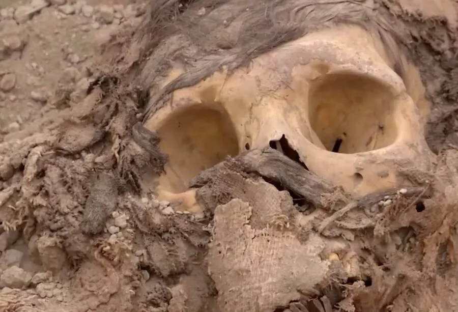 Ancient mummy surrounded by coca leaves unearthed in Peru’s capital