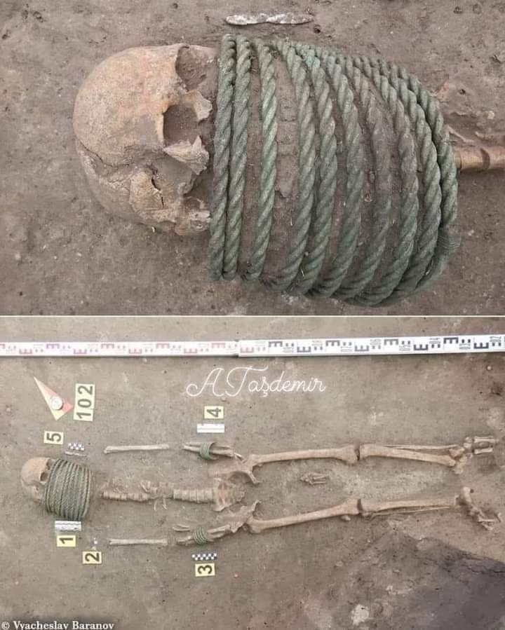 Archaeologists in Ukraine have uncovered a 1,000-year-old cemetery and numerous skeletons buried with rings around their necks and buckets at their feet.