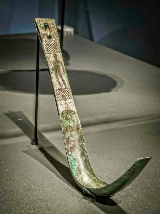 A Roman Decorated Bronze Strigil